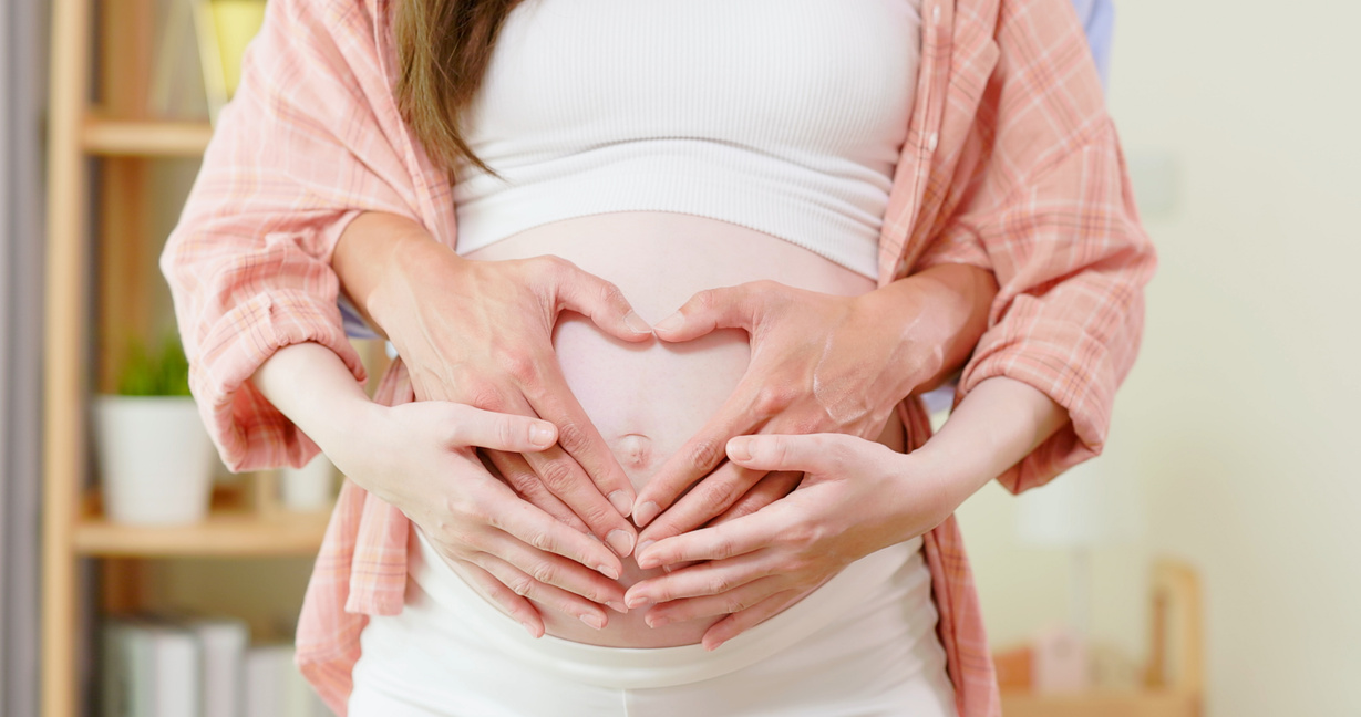 Asian Pregnant Couple Feel Love
